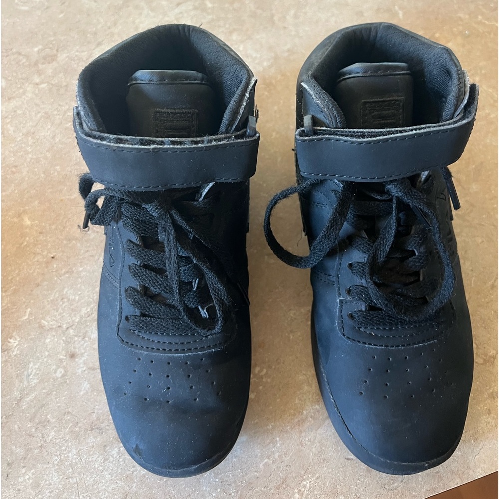Size: 3 All black FILA kids shoes. Slight scuff on right toe area